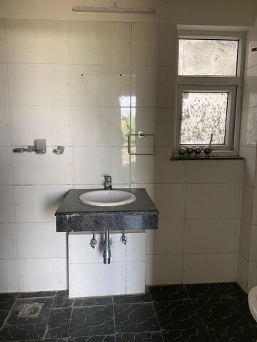 Bathroom in 4 BHK Builder Floor at BPTP Parkland Pride, Sector 77 – for Sale