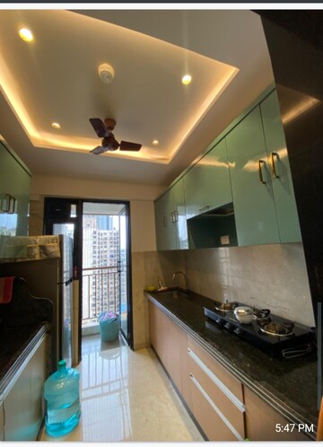 Kitchen in 1.5 BHK Apartment at MICL Aaradhya Highpark, Mira Road – for Sale