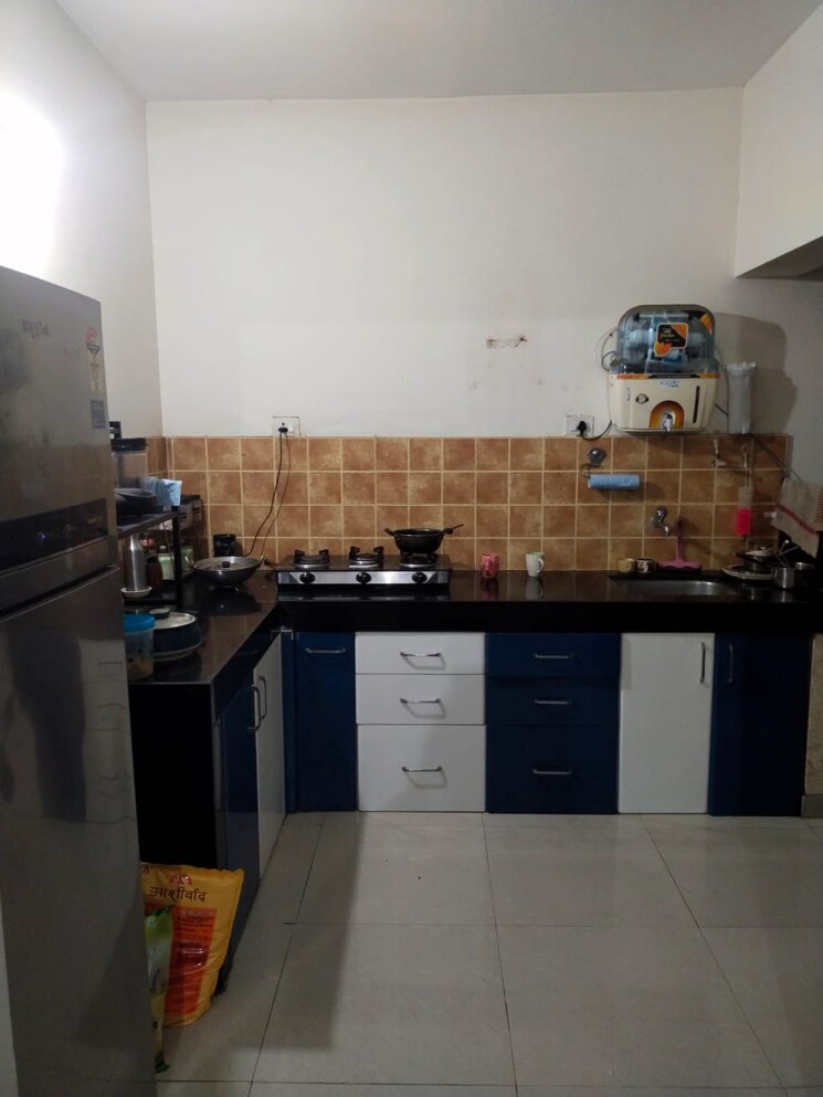 Kitchen, nisarg-darshan-society 3 Bedroom 1500 Sq.Ft. Apartment In Nigdi Pune 7291365