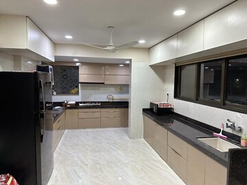 Kitchen in 4 BHK Apartment at Vesu – for Sale