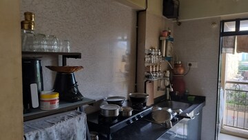 Kitchen in 2 BHK Apartment at Raunak Park View, Ghodbunder Road – for Sale