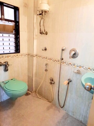 Bathroom in 1 BHK Apartment at Atul Blue Empire, Kandivali West – for Sale