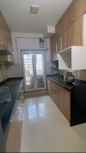 Kitchen in 2 BHK Apartment at Rustomjee Urbania, Majiwada – for Sale