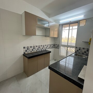 Kitchen in 1 BHK Apartment at Shyam Krupa, Yashavant Nagar – for Sale
