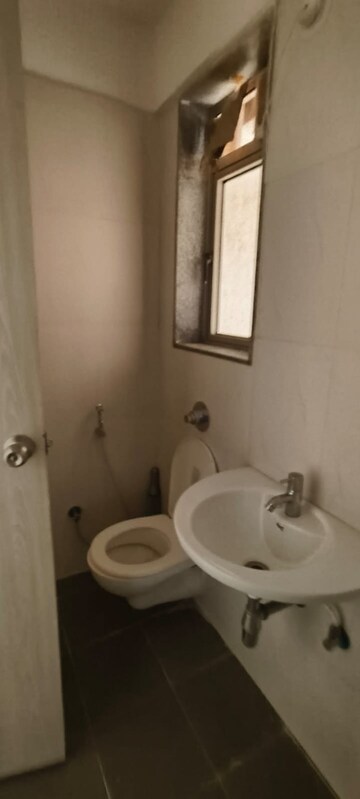 Bathroom in 2 BHK Apartment at Lodha Palava City, Dombivli East – for Rent