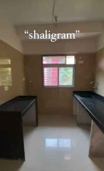 Kitchen in 2 BHK Apartment at Evershine CHS Malad, Malad West – for Sale