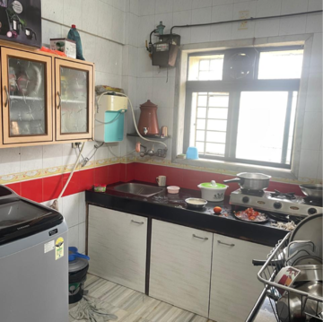 Kitchen in 1 BHK Apartment at Golders Green CHS, Kandarpada – for Sale