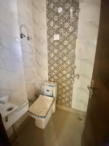 Bathroom in 2 BHK Builder Floor at Dwarka Mor – for Sale