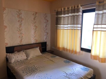 Bedroom in 2 BHK Apartment at Paradigm Antalya, Oshiwara – for Sale