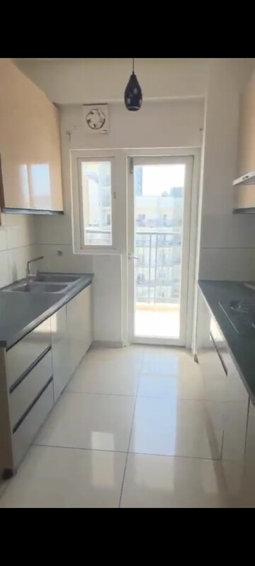 Kitchen in 2 BHK Apartment at Gulshan Botnia, Sector 144 – for Sale