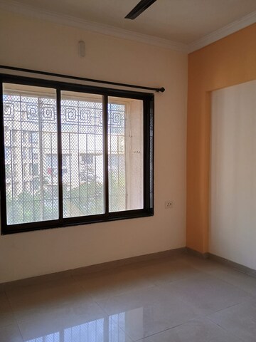 Room in 2 BHK Apartment at Raunak Unnathi Woods Phase 6, Ghodbunder Road – for Sale
