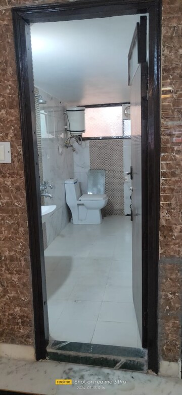 Bathroom in 3 BHK Apartment at Viswakarma Colony – for Sale