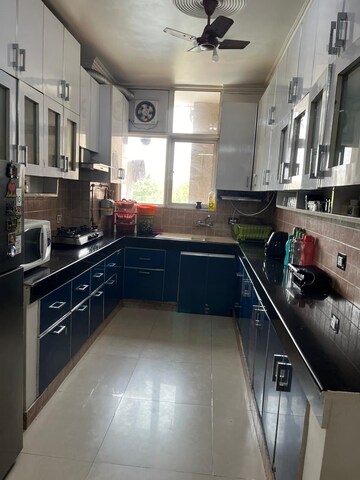 Kitchen in 4 BHK Apartment at Eldeco Green Meadows, Pi Greater Noida – for Rent