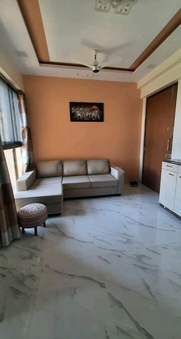 Living Room in 2 BHK Apartment at Rustomjee Urbania, Majiwada – for Sale