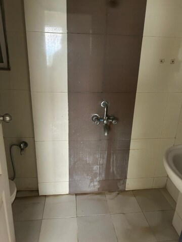 Bathroom in 1 BHK Apartment at Rajhans Kshitij, Vasai West – for Sale