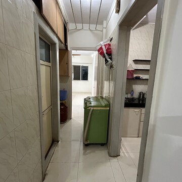 Building Lobby in 1 BHK Apartment at River Park Complex, Konkani Pada – for Sale