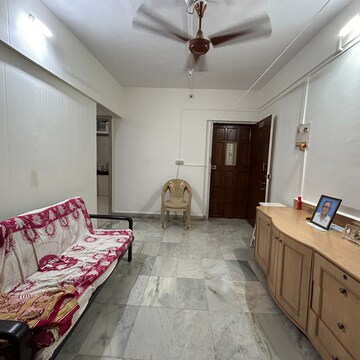Living Room in 1 BHK Apartment at River Park Complex, Konkani Pada – for Sale