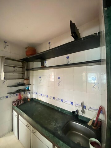Kitchen in 1 RK Apartment at Kharigaon – for Sale