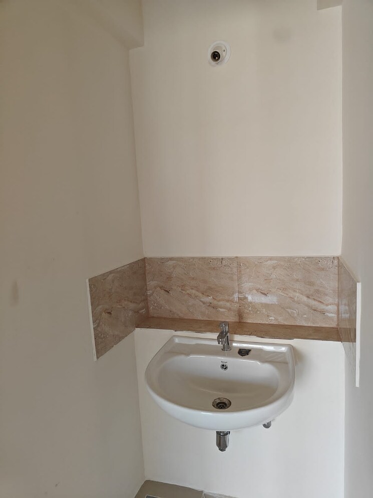 Bathroom, puraniks-aldea-espanola-phase-3 1 Bedroom 460 Sq.Ft. Apartment In Baner Pune 7297365