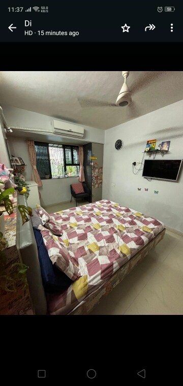 Bedroom in 2 BHK Apartment at Leena Enclave, Kandivali West – for Sale