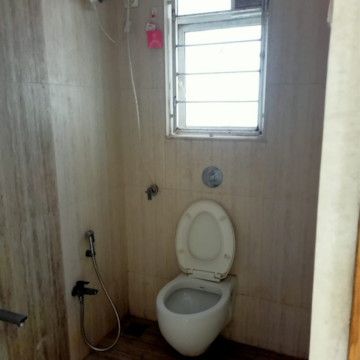 Bathroom in 2 BHK Apartment at Romell Empress, Ic Colony – for Sale