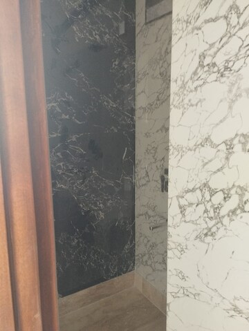 Bathroom in 4 BHK Builder Floor at South Extension I – for Sale