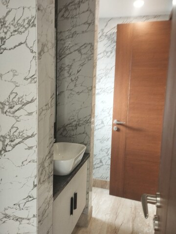 Bathroom in 4 BHK Builder Floor at South Extension I – for Sale