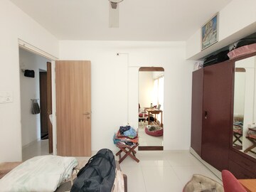 Living Room in 2 BHK Apartment at Godrej Emerald, Ghodbunder Road – for Sale