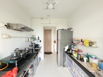 Kitchen in 2 BHK Apartment at Godrej Emerald, Ghodbunder Road – for Sale