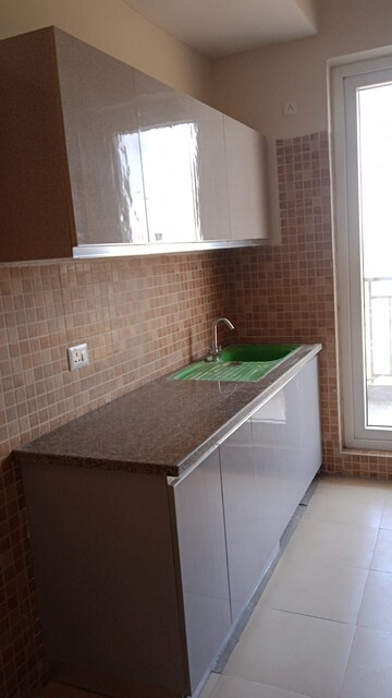 Kitchen in 3.5 BHK Apartment at Emaar Palm Hills, Sector 77 – for Sale