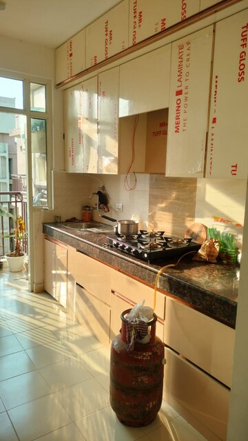 Kitchen in 2.5 BHK Apartment at Shree Vardhman Flora, Sector 90 – for Sale
