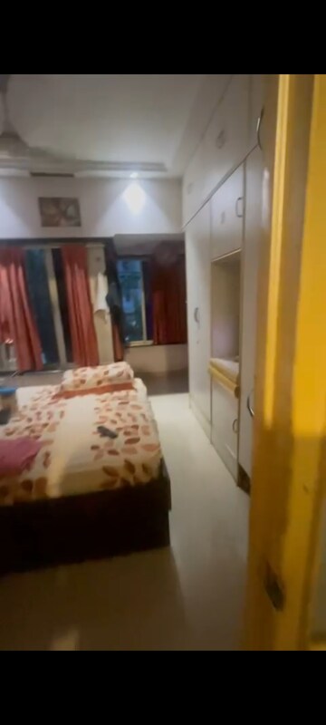 Bedroom in 1 BHK Apartment at Guru Prasad CHSL, Andheri West – for Sale