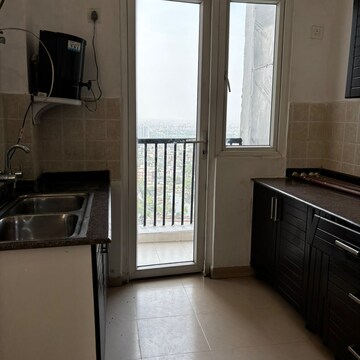 Kitchen in 3.5 BHK Apartment at Amrapali Platinum, Sector 119 – for Sale