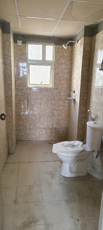 Bathroom in 4 BHK Apartment at Terra Elegance, Alwar Bypass Road – for Sale
