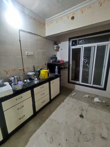 Kitchen in 2 BHK Apartment at Jay Vikram CHS, Seawoods – for Sale