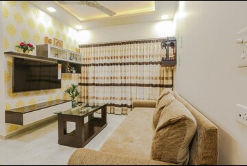 Living Room in 1 BHK Apartment at Lodha Amara, Kolshet Road – for Sale