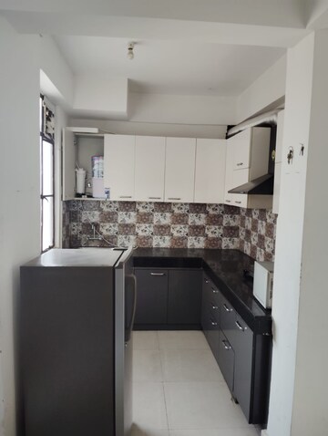 Kitchen in 1 BHK Apartment at Signature Global Synera, Sector 81 – for Sale