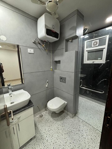 Bathroom in 4 BHK Builder Floor at Rajouri Garden – for Sale