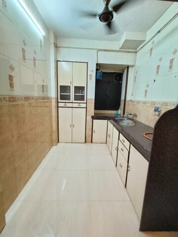 Kitchen in 1 BHK Apartment at Ghodbunder Road – for Sale