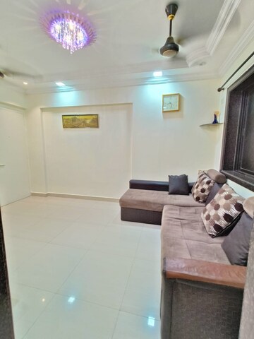 Living Room in 1 BHK Apartment at Ghodbunder Road – for Sale