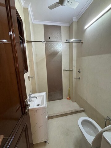 Bathroom in 3 BHK Builder Floor at Rajouri Garden – for Sale