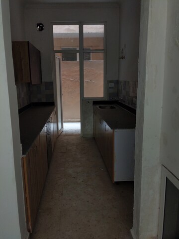 Kitchen in 3 BHK Villa at Amrapali Leisure Valley, Tech Zone 4 Greater Noida – for Sale
