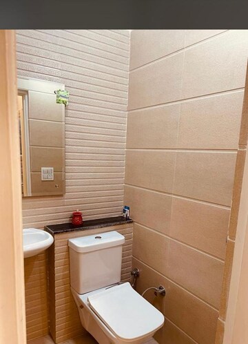 Bathroom in 3 BHK Apartment at Dhakoli Village – for Sale