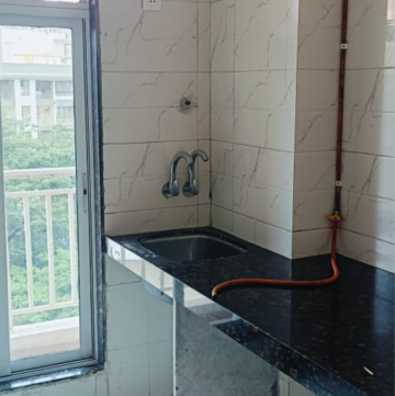 Kitchen in 1 BHK Apartment at Chheda Avighna, Kanakia Road – for Sale