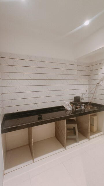 Kitchen in 1 BHK Apartment at Nanak Joy Aura, Ulwe Sector 25a – for Sale