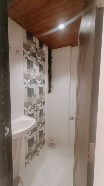 Bathroom in 1 BHK Apartment at Nanak Joy Aura, Ulwe Sector 25a – for Sale