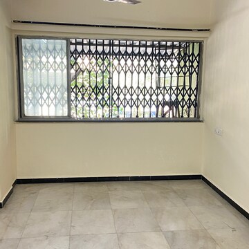 Room in 2 BHK Apartment at Mulund West – for Sale