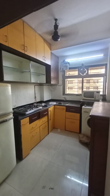 Kitchen in 1 BHK Apartment at New Om Tower, Mira Road East – for Sale
