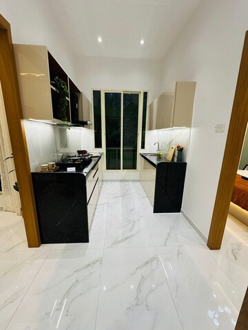 Kitchen in 1 BHK Apartment at Haware Paramount, Muthaval – for Sale
