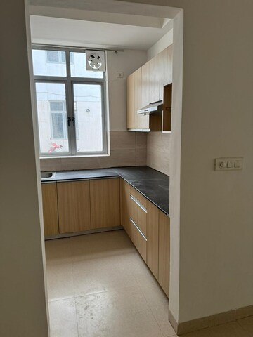 Kitchen in 2 BHK Apartment at Shree Vardhman Green Court, Sector 90 – for Sale